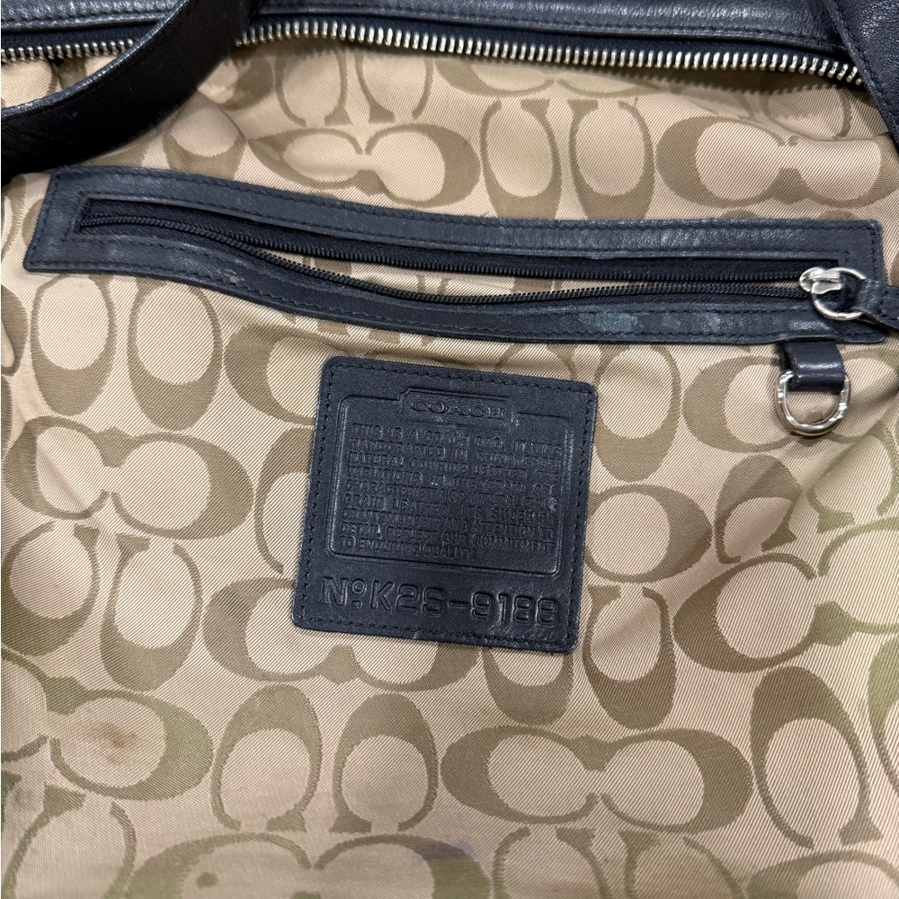 COACH SLIM VINTAGE BLACK 9188
Approximate measurements: 12"L x 3.5"W x 12.5"H
